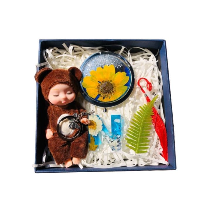 Souvenir-set Bestehend Aus Blumen Und Puppen Zur Dekoration Als Geschenk - Startseite